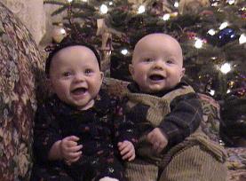 This was the very first picture where they were BOTH smiling!  Christmas 2001.