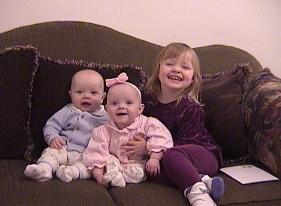 Twins with big sister.  Valentine's Day 2002.  7 months