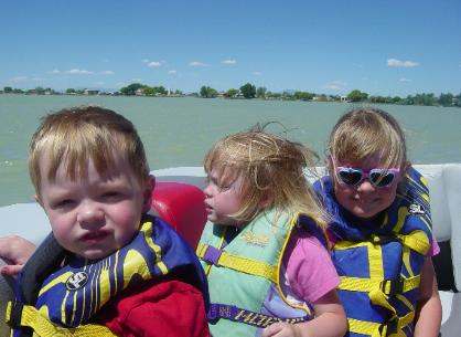 Boating - Summer 2004.  Twins almost 3, Big sister 5
