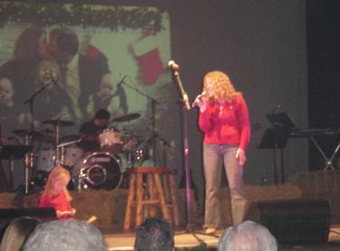 The picture in the background is of Tim and I kissing, Christmas 2001.