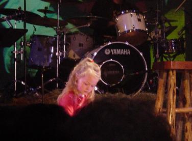 My daughter is looking through photographs.