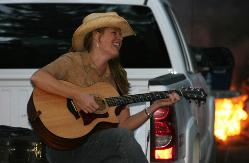 Tim caught me mid laugh!  See the campfire in the background?