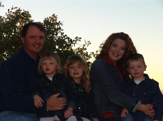 The Bliss Family, late Summer, 2004.  I look like I have a painted on smile...oh, wait...I do.