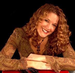 Loreen Bliss, Fall 2004.  Did you know... my hair is naturally curly, but I  used a three barrel curling iron for this picture.